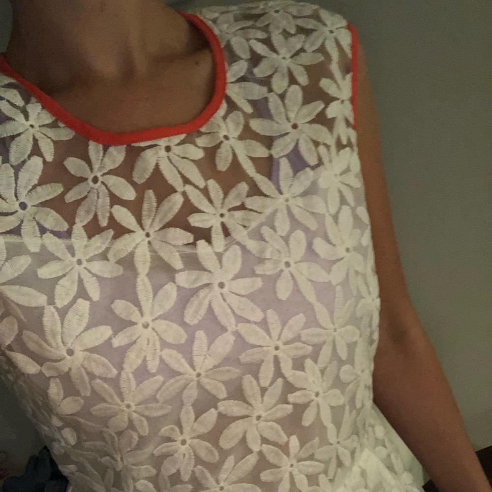 White flower structures peplum top
